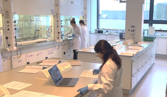 students in a chemistry lab